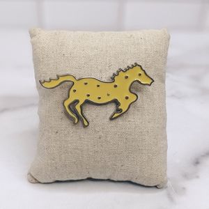 Yellow mustang pin back brooch